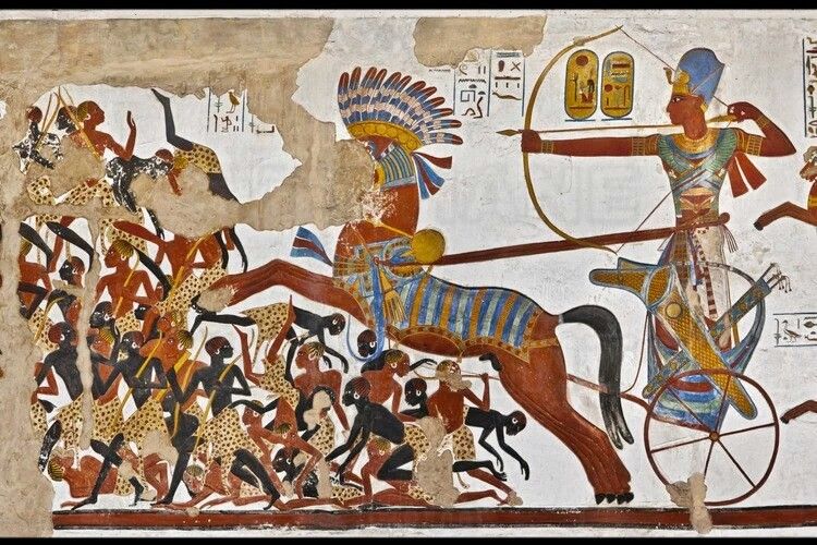 Let's see how egyptians depicted their actual, black, neighbouring enemies, in comparison.