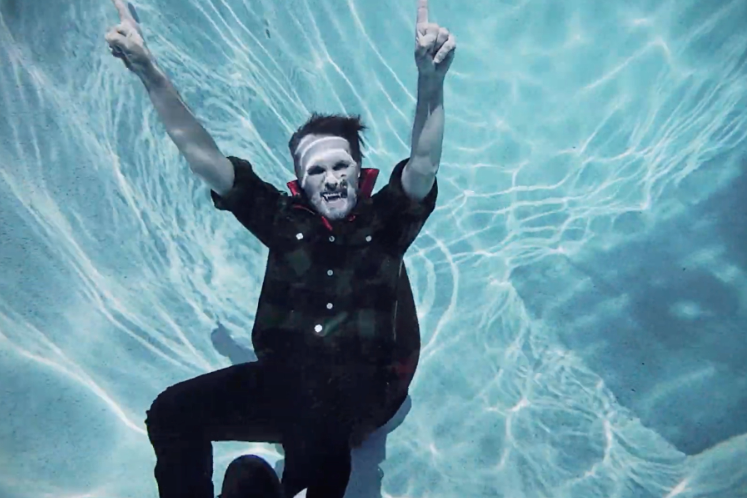Mike Viola is a pool-lazing vampire in the "Drug Rug" video, featuring Mandy Moore rol.st/3iADOZM