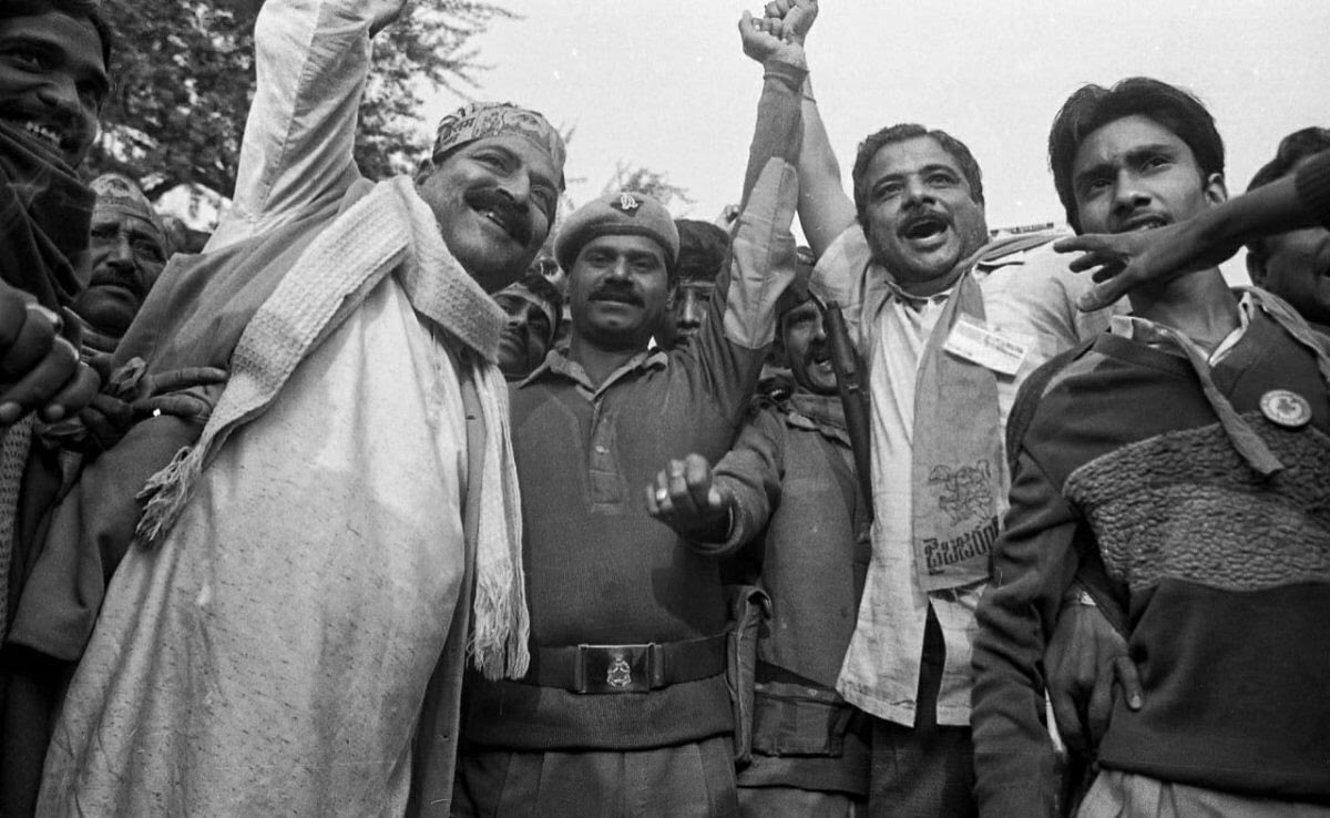 Amid a rehearsal a day before the actual demolition, an Uttar Pradesh policeman joins kar sevaks in shouting slogan ‘Jai Shri Ram’, which came to be associated with the Ram Janmabhoomi movement