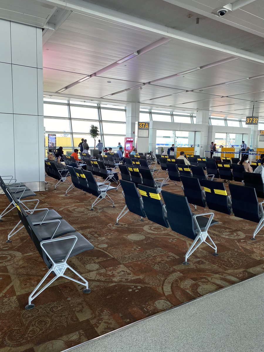 Seating at the gate is nicely spread out. Not sure how it will be in smaller airports. Middle seats have signage saying ‘dont sit here’. Not that most people are respecting it! 9/n