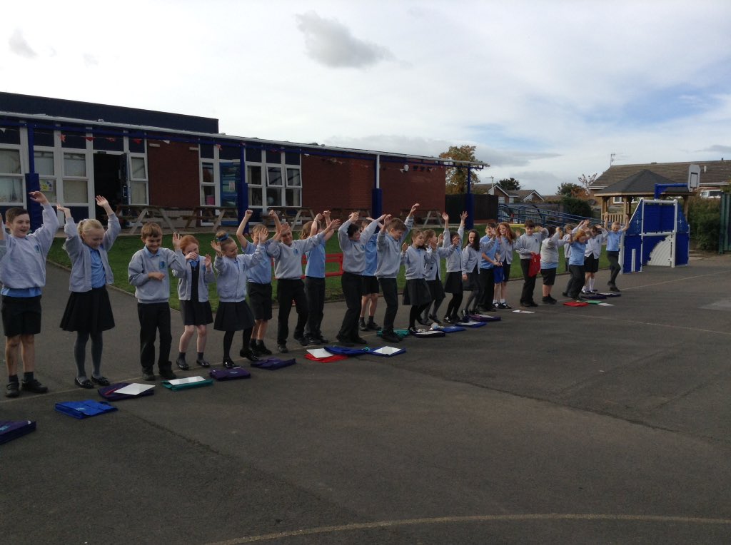 StAgnesY5's tweet image. Learning to code and she sequencing outside with our peers as the robots 😀 #stagnescomputing