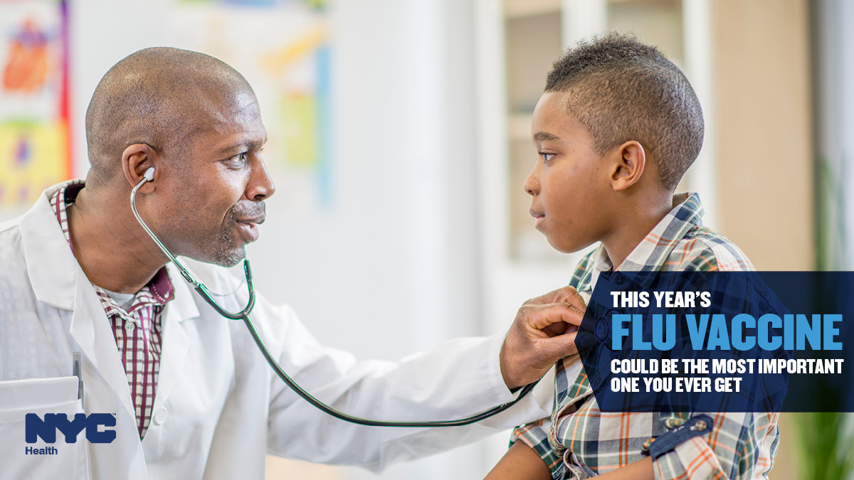 A Black doctor uses his stethoscope to listen to the heart of a young Black boy. Text reads, "This year's flu vaccine could be the most important one you ever get."
