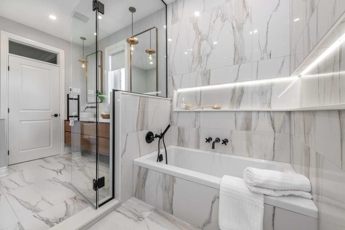 Entries 881 &amp; 882 by <a href="/ArtiumDesign/">ARTium Design Build</a>: Voting continues for the People’s Choice Award in the <a href="/gohba_ottawa/">Ottawa Home Builders</a> #GOHBAawards. 
Choose your favourite #bathroom until Sunday.
Award details: bit.ly/3n0UJYO
To vote: bit.ly/2P87grF
#Ottawaawards #HousingDesignAwards