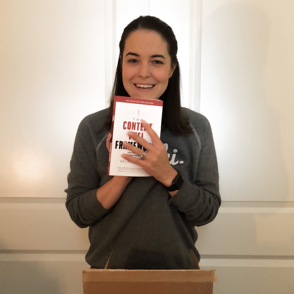 I planned to launch in the new year to make a splash just as I was returning from maternity leave. Here’s me holding a print copy for the first time, having absolutely no clue what 2020 had in store for. (Look at all the hope in those eyes).