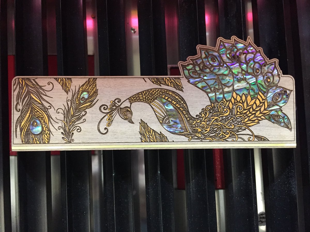 HPCLaser's tweet image. A client made this stunning bookmark using Mother of Pearl inlays and gold paint on walnut 🦚

#lasercut #design #laser #engraving