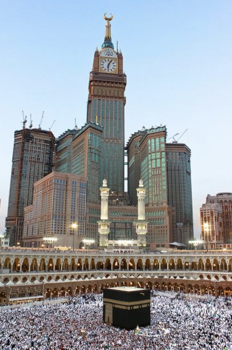 Our simulated reality is sometimes represented by a cube, and some say The Kaaba is one of these symbolic structures. The Kaaba sits between two pillars underneath a clocktower with a crescent moon on top.