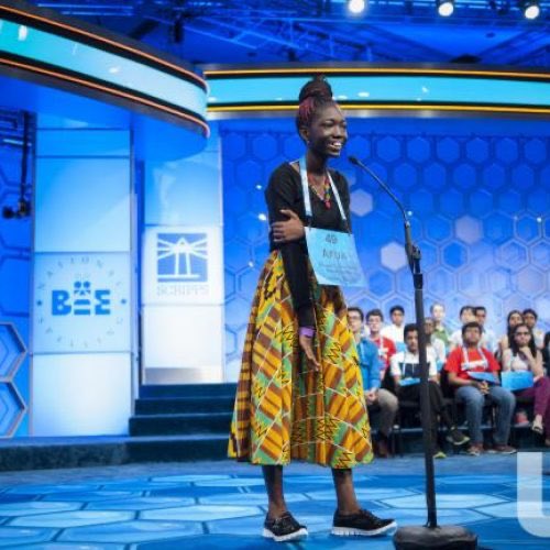 AchimotaSchool's tweet photo. Meet 👸🏾 Afua Ansah #LivingWatersToAThirstyLand 

In front of the stage, holding her nation’s flag, 🇬🇭she politely answered questions from reporters after being crowned as Ghana’s first ever World Spelling Bee finalist. #NoAchimotaNoGhana🇬🇭 https://t.co/sMaIBQV2pR
