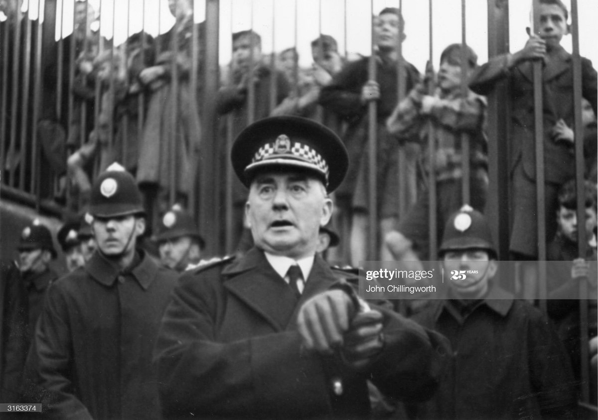 Cops at Ibrox for a Rangers vs Celtic match, 1949. Original Publication: Picture Post - 4894 - Glasgow's Football War - pub. 1949 Photo by John Chillingworth/Picture Post