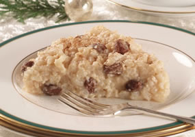 A fun dessert for the holidays is ARROZ CON DULCE. This is like a rice pudding, but better. It's made with coconut milk and cinnamon and other spices, and it comes out more like a slice of yum yum pie.