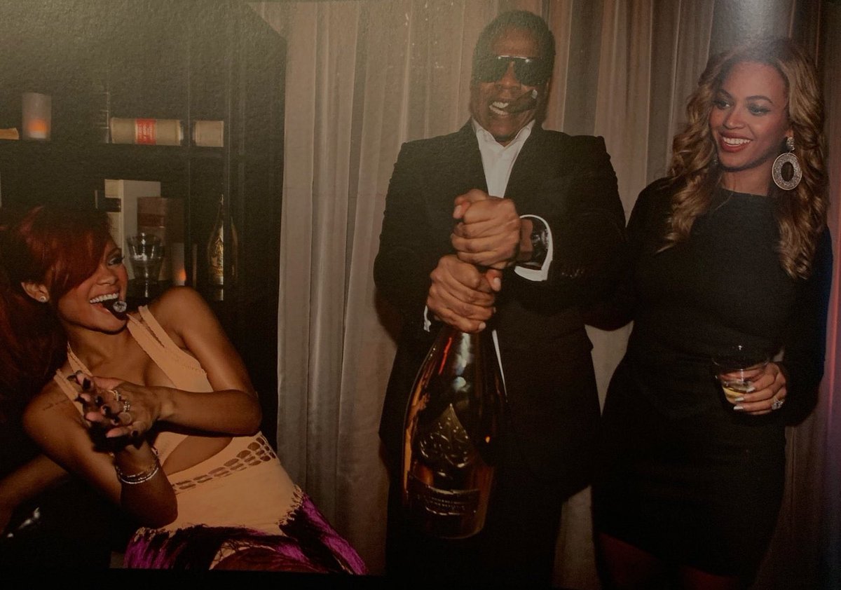 Beyoncé and JAY-Z are featured on Rihanna’s coffee table book.