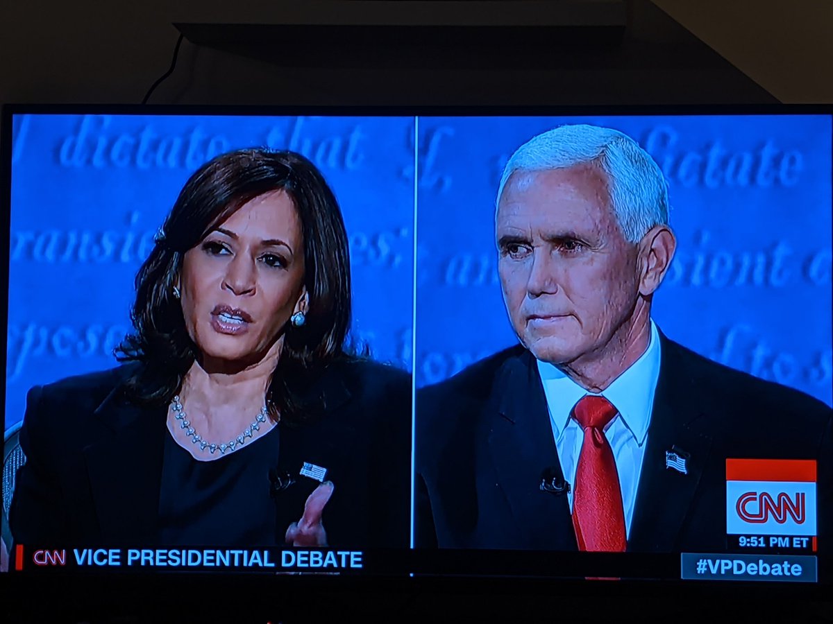 He positively looks like someone trying to figure out why Kamala's skin has hue.