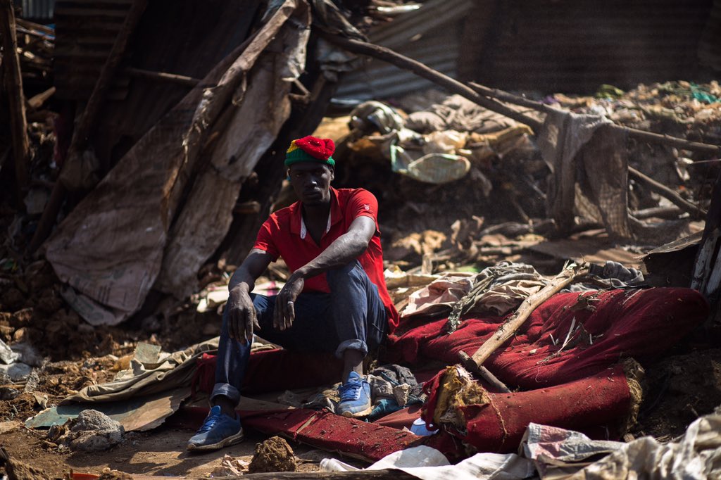 Alex Owino. Married with 2 children. Has been in Kibera for the last 16 years. His kids spent last night at his mom's while he and the wife spent the night in the cold guarding what was left of their house. His contact 0793621412