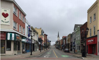 NewmarketHS's tweet photo. #TBT to the start of the pandemic with not a person to be seen on Main Street! 📷  by Bob Buchan #newmarkeths https://t.co/5ic3Mog1AV