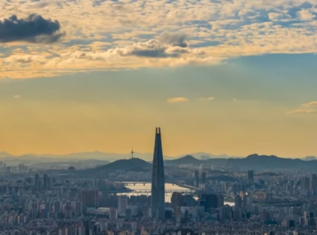 1. Lotte TowerThe MV starts with a distant view of this building towering over landscape of Seoul. With its 556-memter height, the skyscraper is the tallest building in South Korea (located in Jamsil). I remember construction of this tower was quite controversial back then