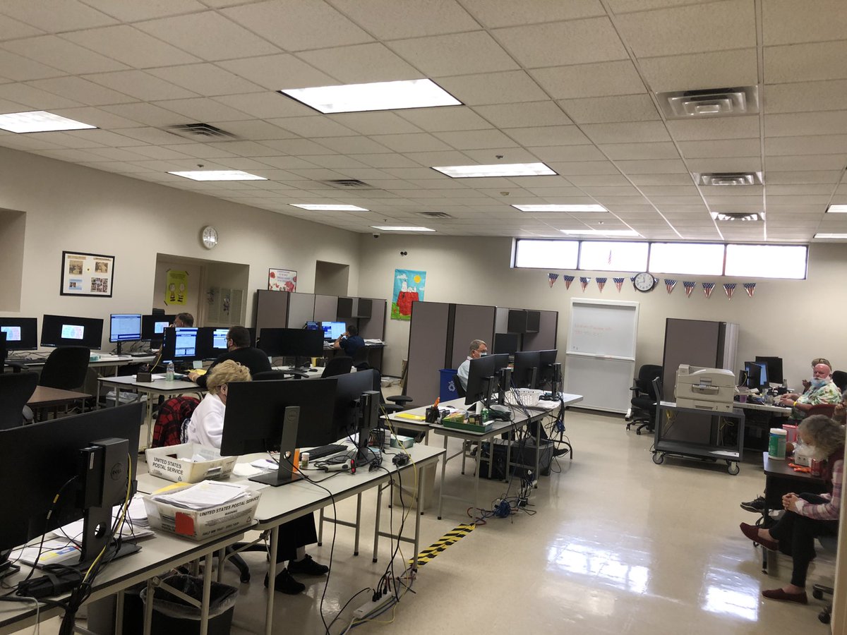 Here’s the room where officials are verifying the signature on every mail-in ballot envelope. TWO officials check each signature against one’s signature recorded in the voter registration database or other files (like DMV) if necessary. If not verified, then county calls voter—  https://twitter.com/vaughnhillyard/status/1319415787807858689