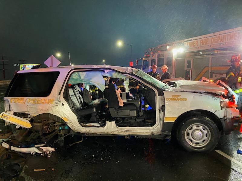 Denver_Fire's tweet photo. Responding lights &amp; sirens to a fire the #DenverFireDepartment Shift Commander was hit by a car causing the command vehicle to rollover trapping our Chief. After extrication efforts the Chief was removed &amp; luckily suffered minor injuries. @CityofDenver #YieldtoEmergencyVehicles https://t.co/HNCXAMImg1