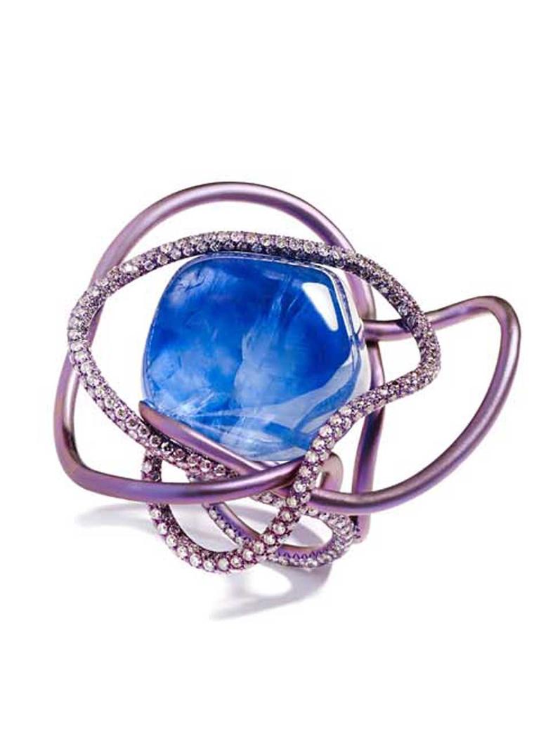 Also from Syz - she's one of my faves, I'm sure that's a surprise - a 52ct sapphire, it's a ring. A very extra ring. That's almost got to be titanium to hold on to that rock.