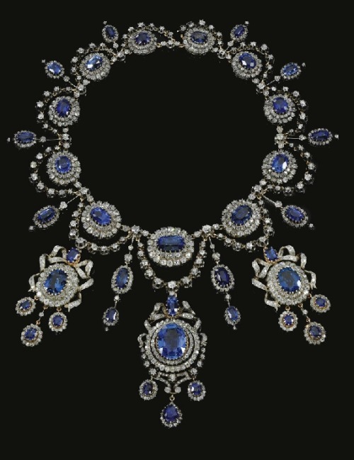 An insane sapphire suite that also was up for auction recently. Don't know if the earrings are the same as the two pendants on the necklace, detached, or their own deal. I lean toward separate, there are variations with the ribbons.