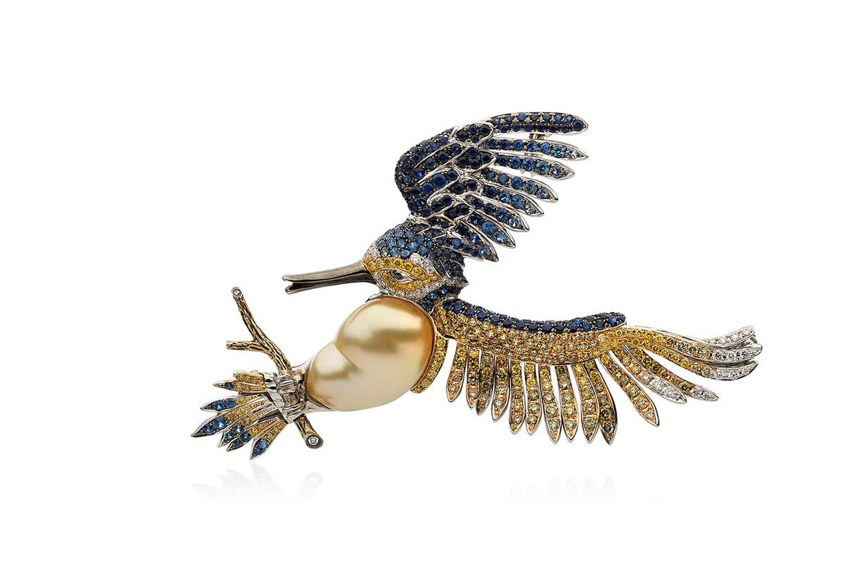 From Autore. Sapphires for sure. They definitely pass the baroque pearl test. Love this one, they really captured a bird in motion. (It's a brooch.)