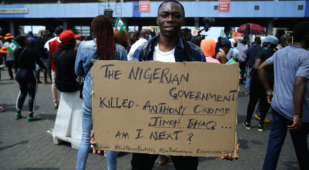 AJEnglish's tweet photo. The #EndSARS &amp; #EndSWAT protests continue, as thousands of Nigerians unite their voices to protest against police brutality and demand justice for victims — in pictures https://t.co/BurMov5kC2 https://t.co/60hEemP4eg