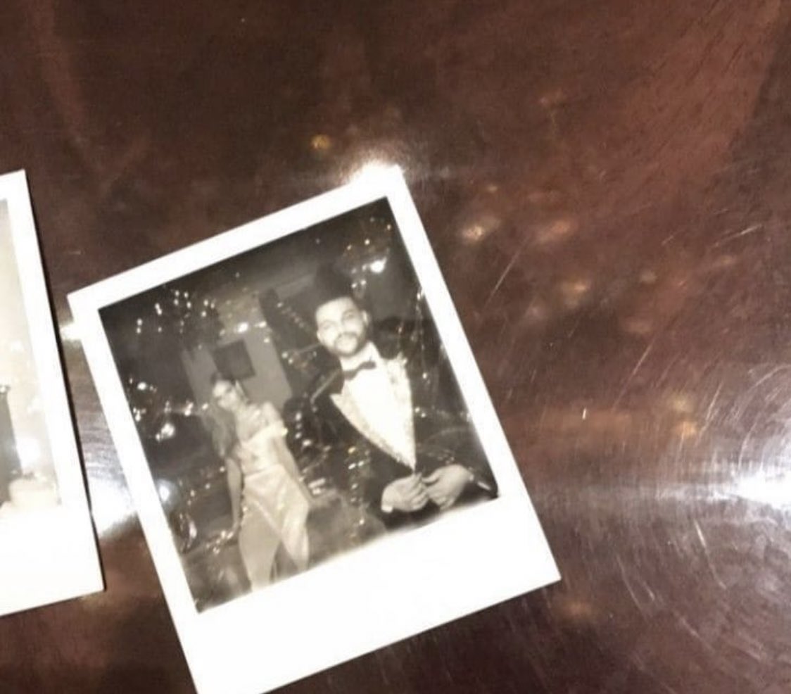 In this part here, Selena takes a picture of the guy using a Polaroid camera. If you know Selena at all, you’d know she loves her Polaroid pictures. She also carried it on her shoulder when she took Abel to the Harper’s BAZAAR event in 2017.