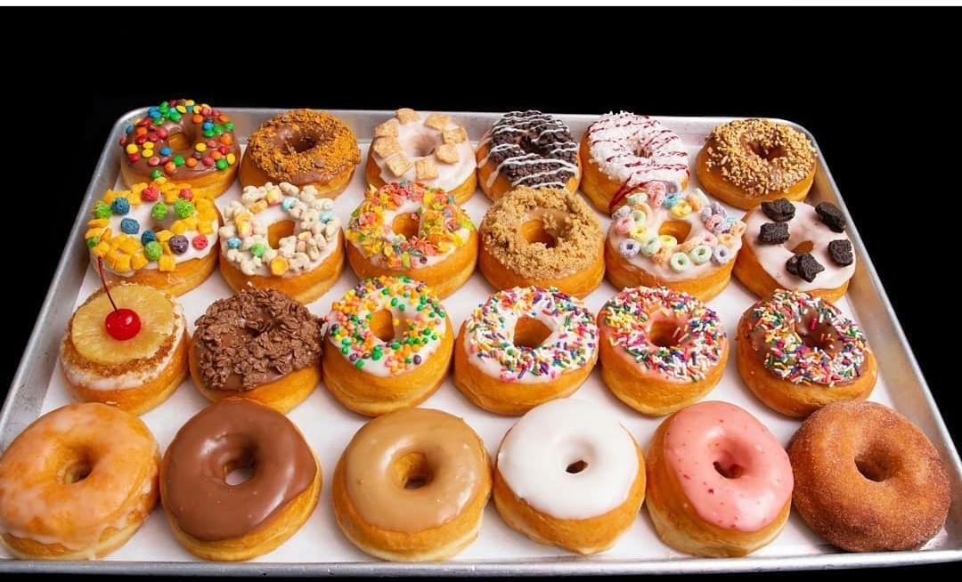 Today we'll give you 2 dozen reasons to smile 🙂. #EatGlazed #MadeWithLove #24hrs