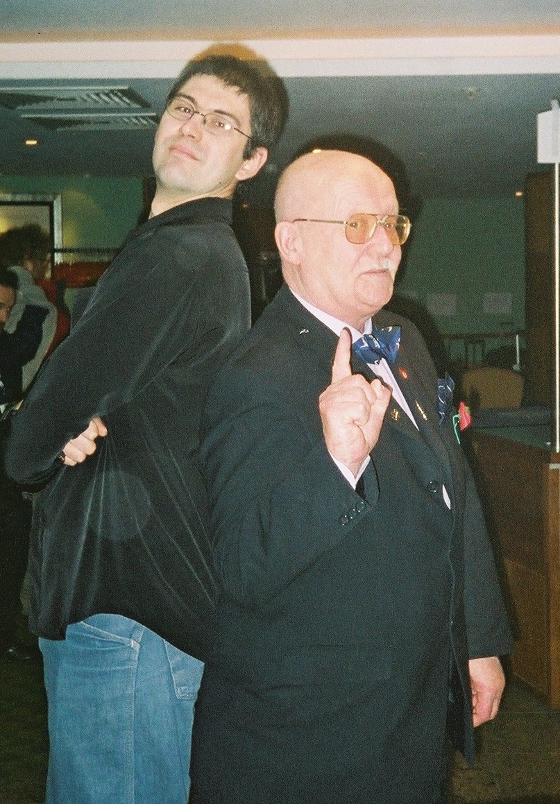 Today's Camping It Up Star is one of Doctor Who's most prolific guest star, Michael Sheard. As you'd expect, he gave the back to back pose his all and far outshines me! This was from 2003 at the shambolic but fun Panopticon 40 event, where Michael Sheard set up his own stall!