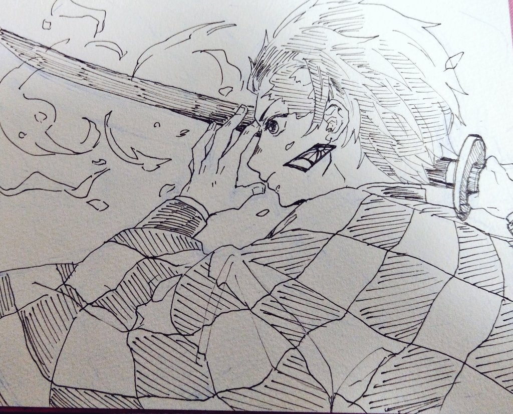 日輪刀の鍔がなんちゃってな炭治郎らくがき 