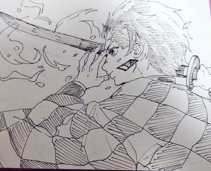 日輪刀の鍔がなんちゃってな炭治郎らくがき 