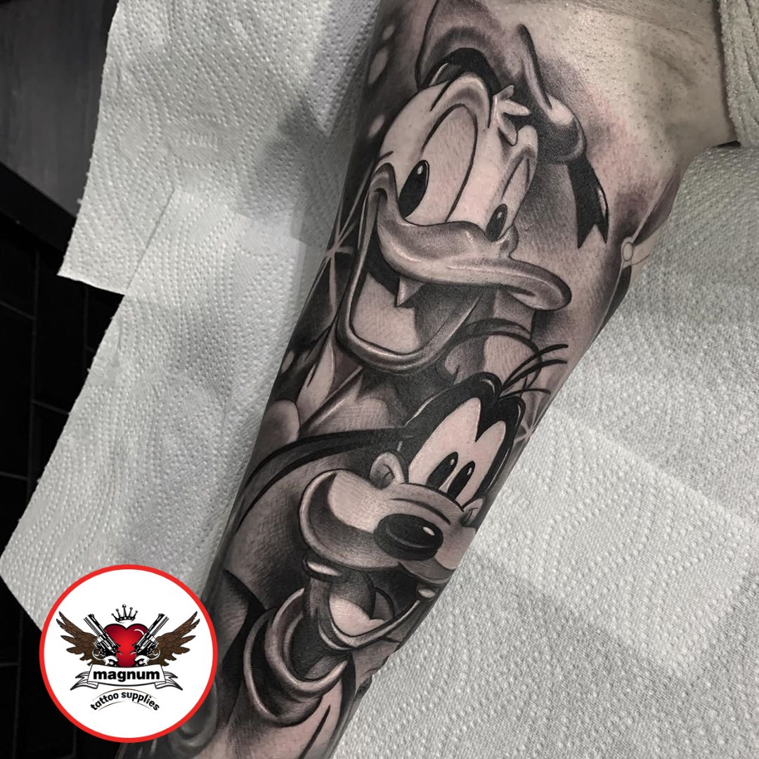 Donald Duck tattoo located on the inner forearm