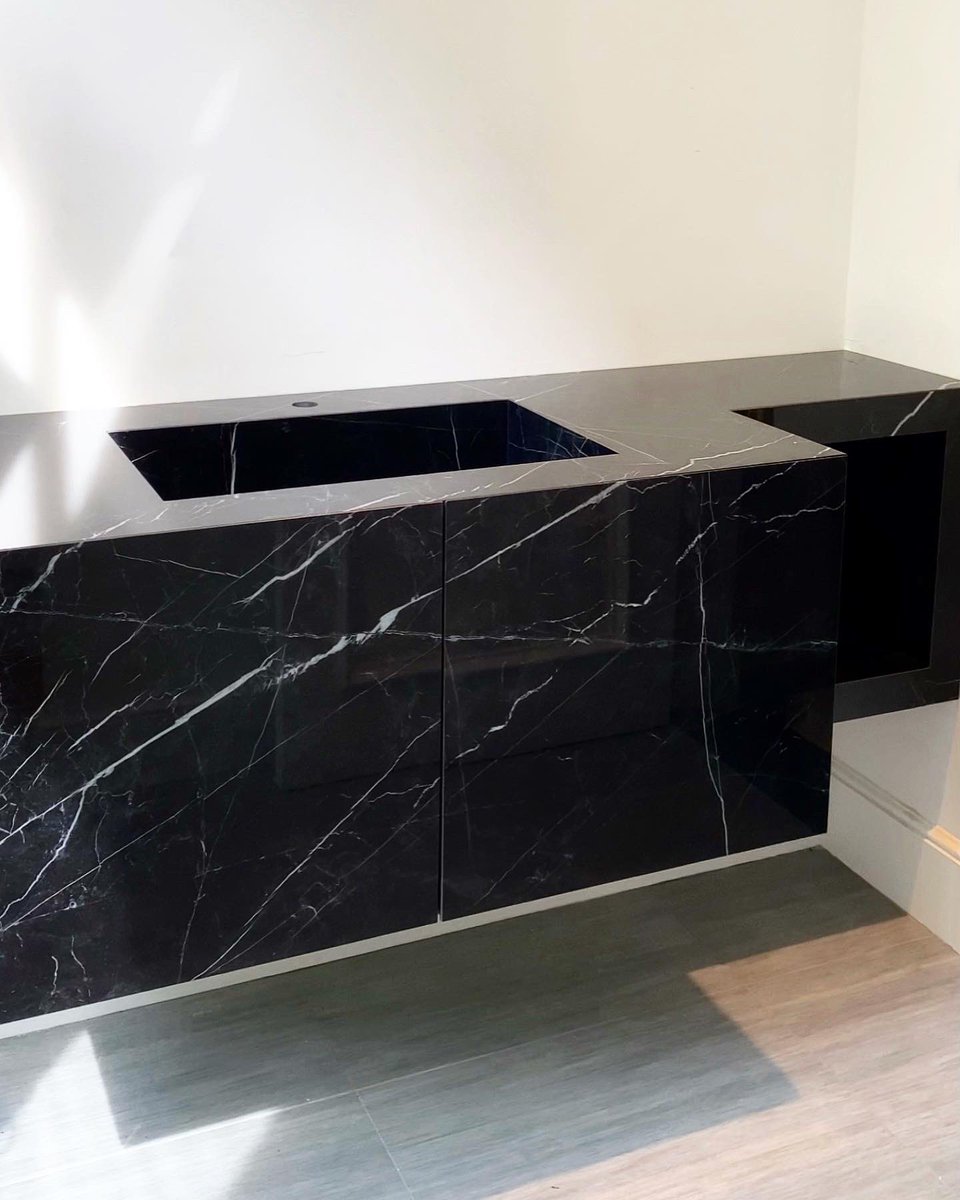 FCountertops's tweet photo. JUST INSTALLED - As you all saw on our instagram stories yesterday. A custom Powder Room cabinet wrapped up in Black Marquina porcelain with an integrated sink that slopes into the drain, side shelves and of course front door panels. 
#interiordesign #architecture https://t.co/l63TSmIM5h