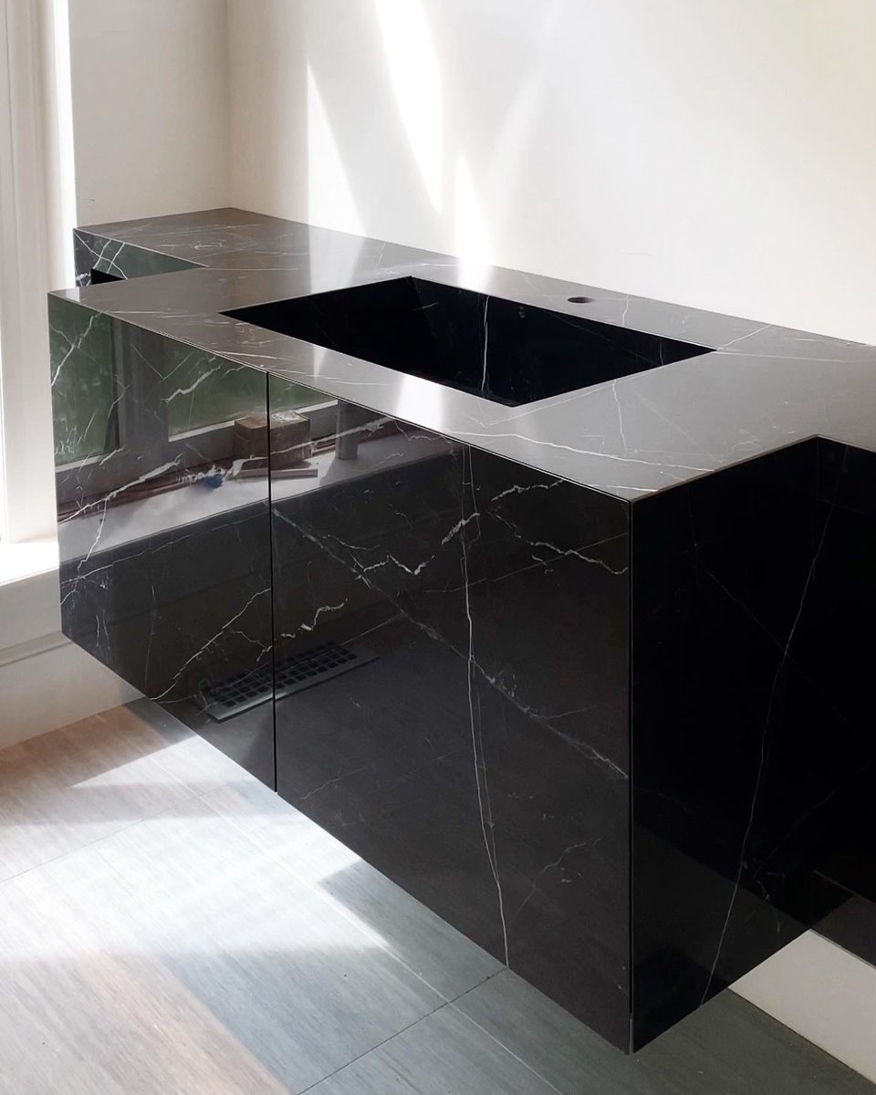 FCountertops's tweet photo. JUST INSTALLED - As you all saw on our instagram stories yesterday. A custom Powder Room cabinet wrapped up in Black Marquina porcelain with an integrated sink that slopes into the drain, side shelves and of course front door panels. 
#interiordesign #architecture https://t.co/l63TSmIM5h
