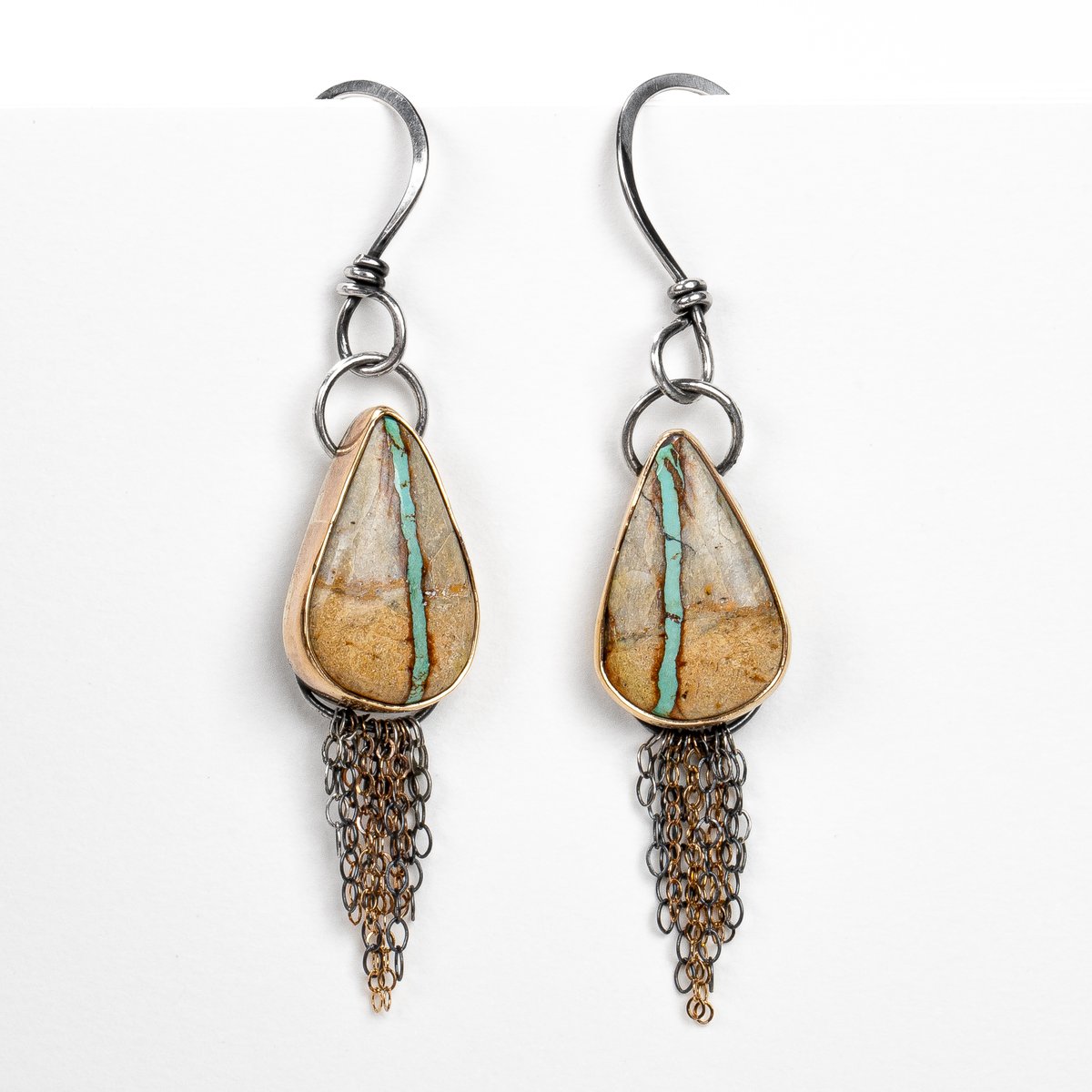 Created from Sterling and 14K Gold. Mixed metal fringe below Royston Ribbon Turquoise. Backs are engraved with pretty branches, makers mark, quality mark of .925 and 14K. Avail. October 28th, 4PM CDT. #earrings #fringe #goldandsilver #14kgold #turquoise #roystonribbonturquoise https://t.co/2cHuHhai7E