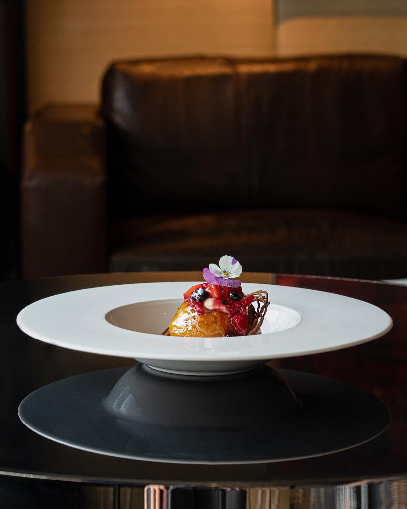 PoloBarMayfair's tweet photo. What's soft and fluffy and contains a delicious combination of rum, berries and cream? 
Answer: The Polo Bar’s Rum Baba 
#PoloBarMayfair #rumbaba #DiplomáticoRum #sweet #treat #finedininglondon #dessertmonth #dessert #sweettooth #dessertlover
Photo by @EnjoMedia https://t.co/JTcpiltR6U