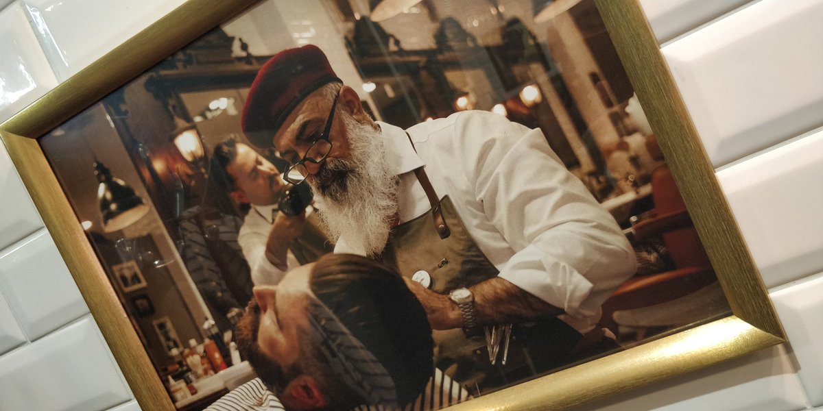 MiloshTheMedic's tweet photo. My barbershop's owner is literally Kaid from @Rainbow6Game. https://t.co/ZemXNdz7mr