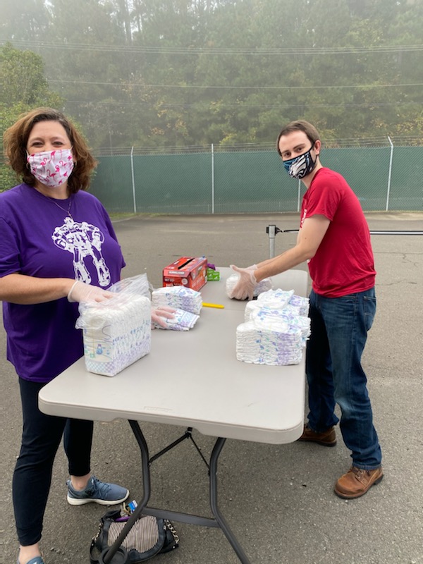 copycei's tweet photo. Nope #COVID19 is not going to stop the CEI crew from volunteering and helping @MorrisvilleNC and the @DiaperBankNC!  #ServeMorrisville #CEIserves @activategood https://t.co/hzRwDUd6VC