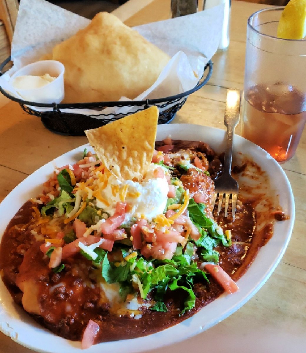 One of our favorites: Stuffed Sopapilla! Two delicate sopapillas stuffed with beans, cheese, onion and ground beef. Your choice of chile is ladled on, then crowned with guacamole and sour cream. #Taos
📷 | Pat W.