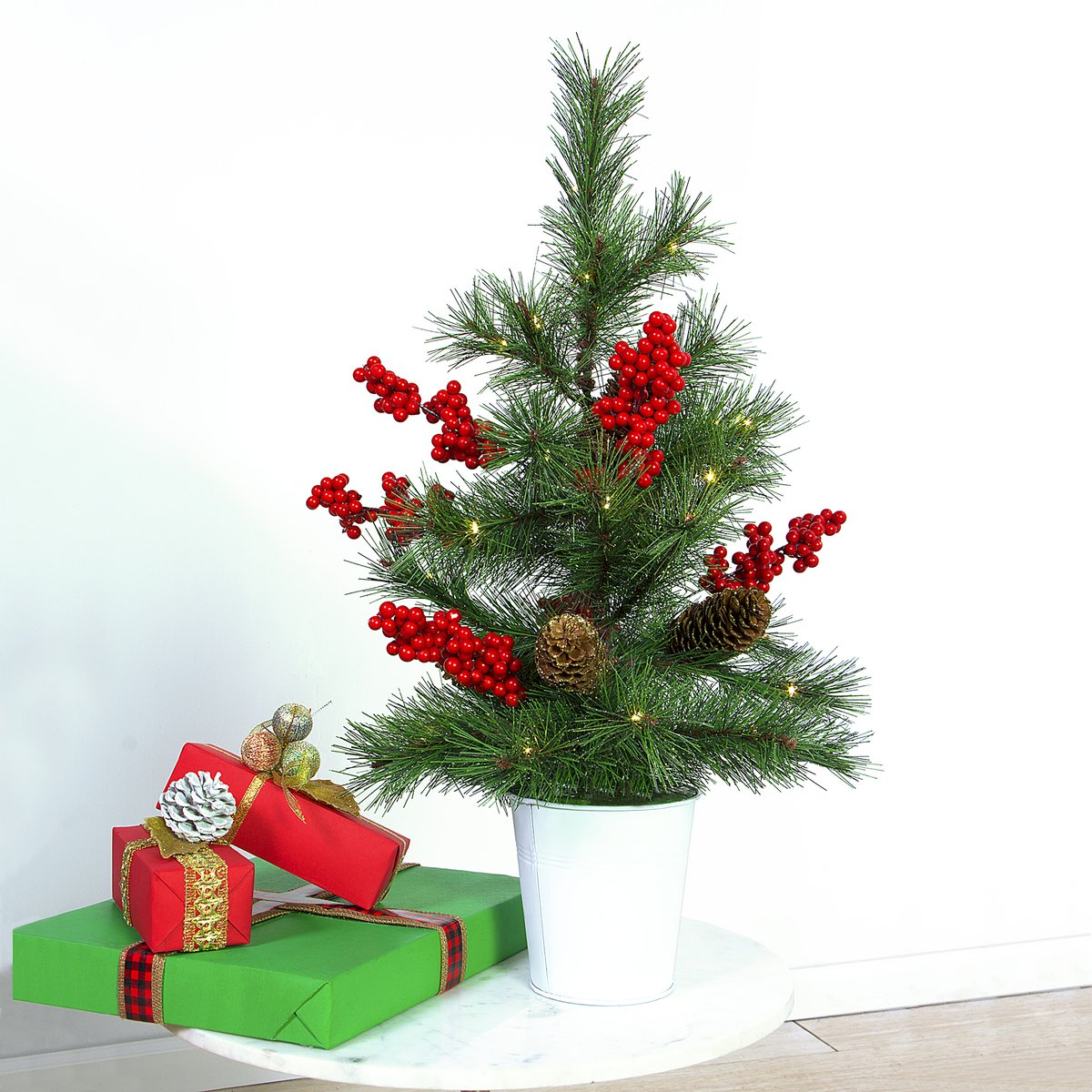 Easy Treezy sells pre-lit table top trees. These little trees are perfect for a small table, desk, or as a gift. #easytreezy #tabletoptrees #easychristmasdecorating #smallchristmastrees