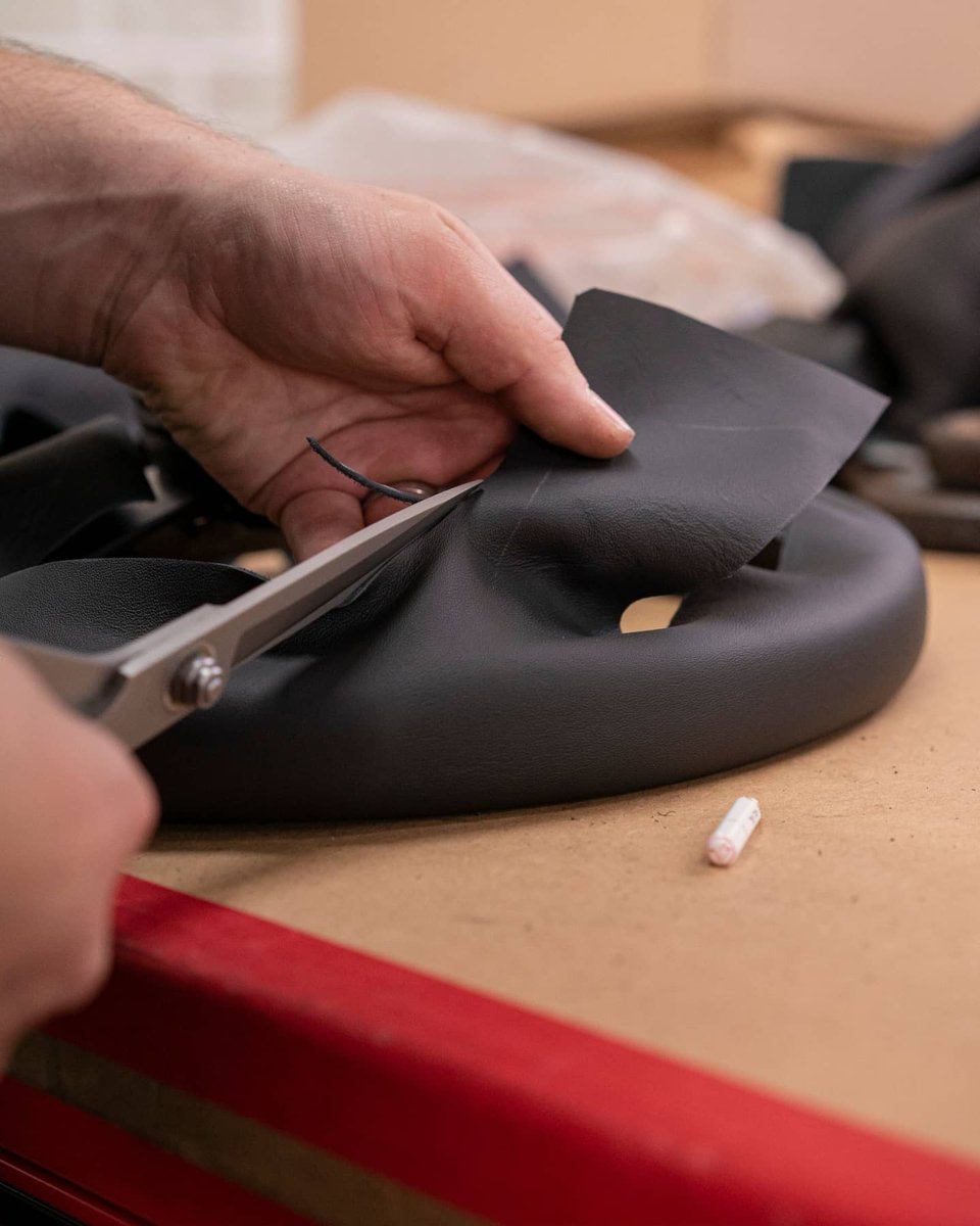 dclassauto's tweet image. Audi S2 steering wheel retrim today. This wheel had been previously retrimmed and had some body filler hiding underneath. Not ideal but sure enough we corrected this and trimmed the wheel in black nappa leather with matching stitching. Extra cushioning was also added.