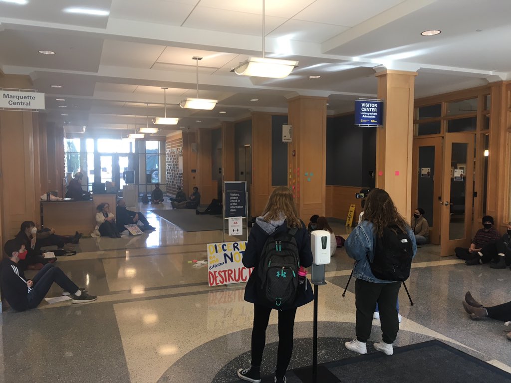 MarquetteUnion's tweet image. We are about 40 strong down here at Zilber Hall. Undergrads have organized this action to defend faculty and staff jobs--who are facing hundreds of job cuts and a 45 million dollar budget cut! We are here all day supporting these student leaders