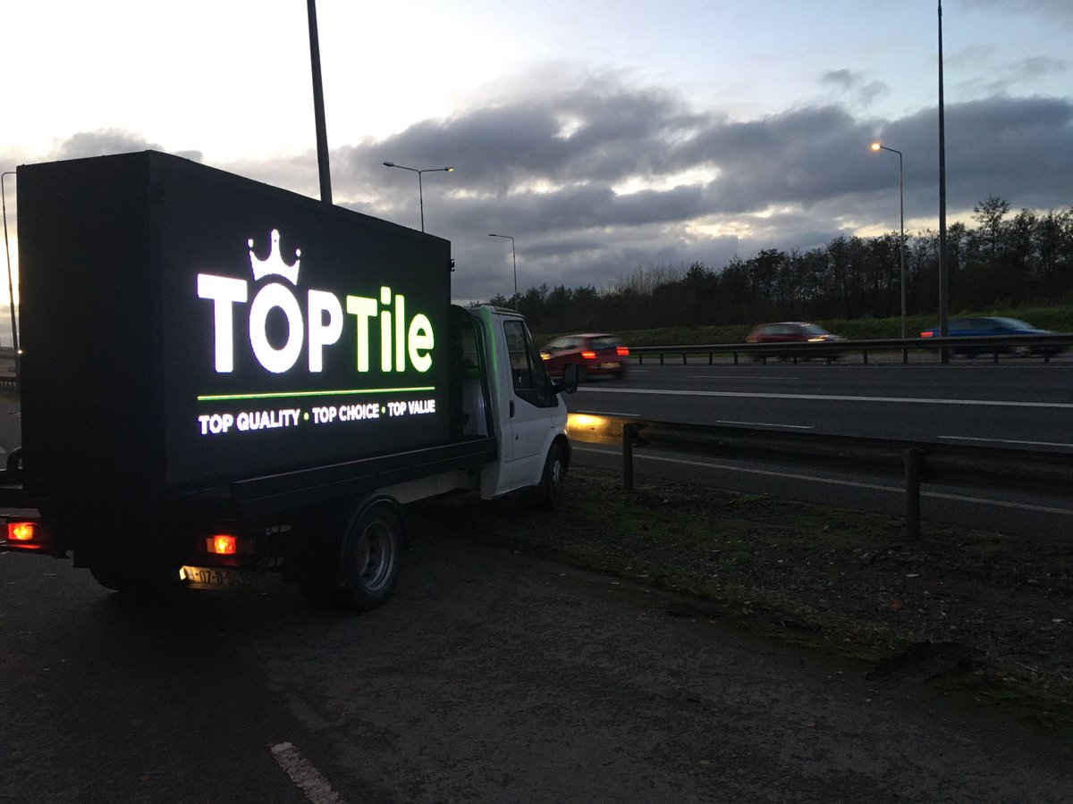 BigPixIRL's tweet photo. Things are very busy on the roads today at Kinsale Road and around the Douglas area. We are now at Kinsale Road capturing the attention of thousands of commuters. 

@RochestownPark @corkindo 
Top Tiles 
DAYNIGHT Security
Barry Developments
Designer Tiles Douglas https://t.co/cSzmdhyWpd