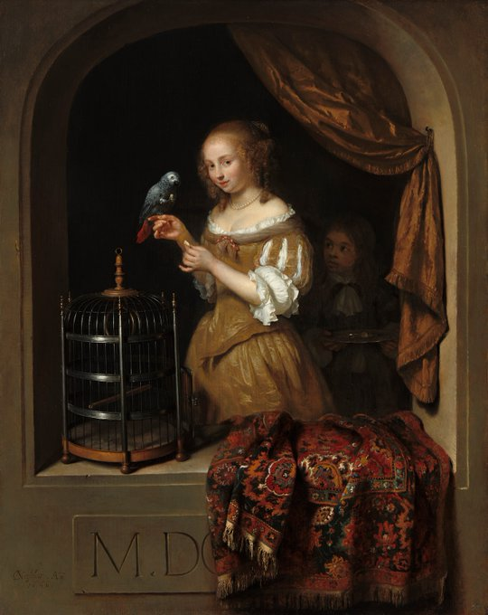 AngelicaPeyrac's tweet photo. Mujer joven alimentando a un loro (1666) es una de los mejores obras de #Netscher. Una joven elegante nos mira con coquetería mientras alimenta a un loro posado en su mano derecha. Desde los oscuros recovecos del interior, un paje atento la mira sosteniendo una bandeja de plata. https://t.co/Gn3i6CqMZp