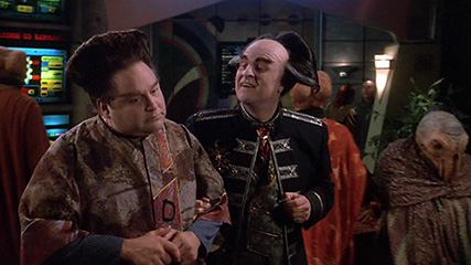 But it's also a pun, because one of the characters on Babylon 5 is the Centauri Vir Cotto (left), assistant to the Centauri ambassador Londo Mollari (center)