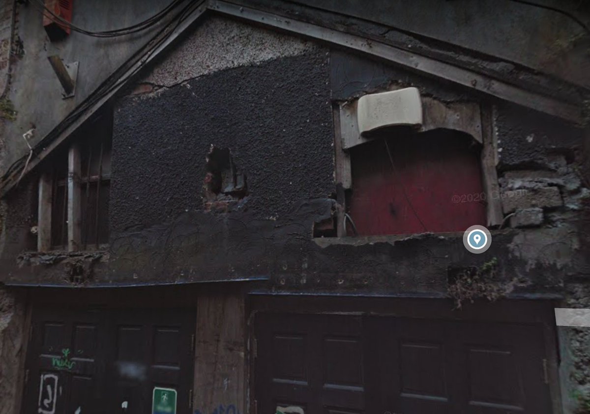 this is a really weird one, picture a historic lane right in the centre of Cork citywith this building in it crumbling for at least 6 years ( @googlemaps RHS, 2014)one positive, it looks like a much needed tree is growing out of it No. 134  #respect  #regeneration  #economy