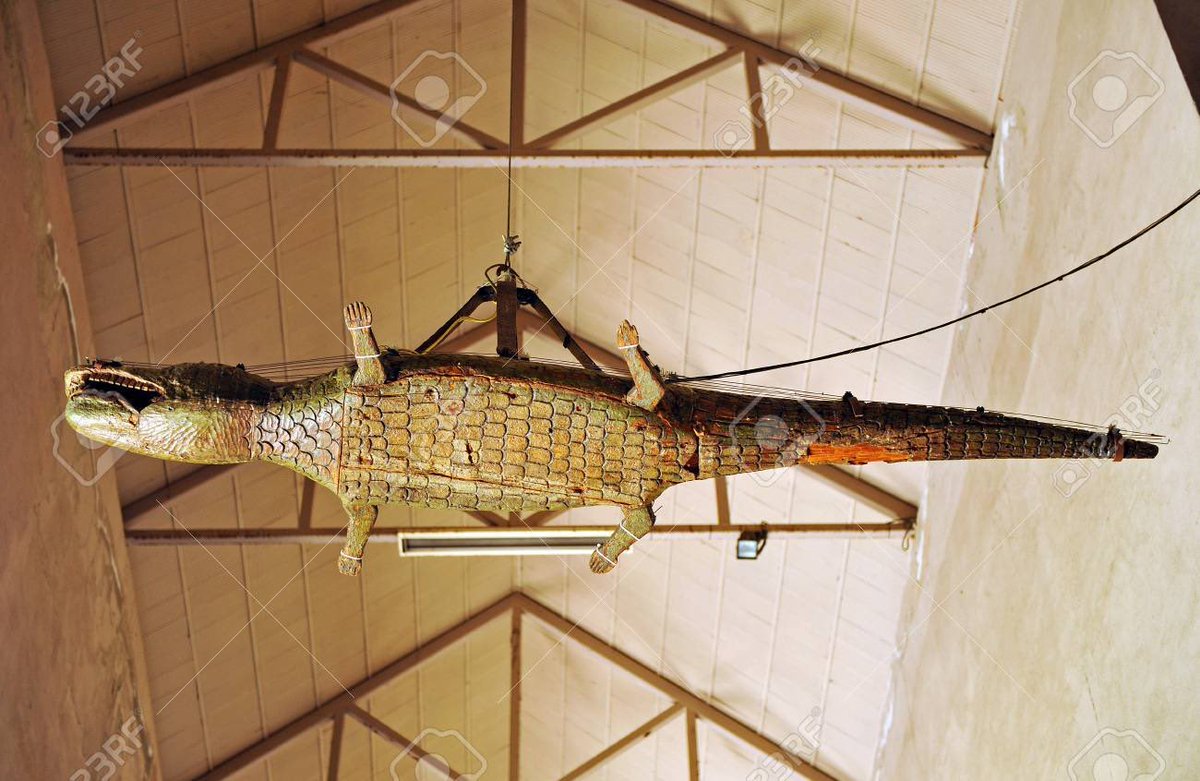 There’s also apparently a wooden carved ceiling alligator in the cathedral of Sevilla This one apparently scares away evil spirits with it’s scary face