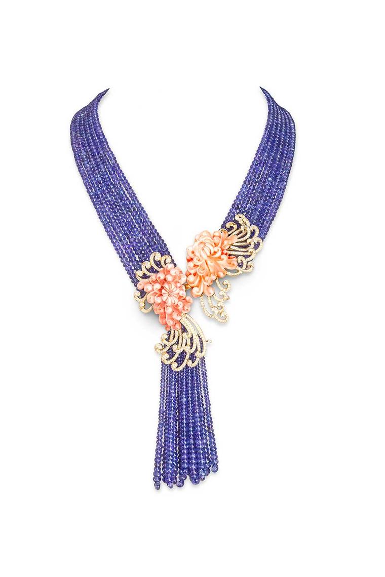 From Kahn, tanzanite beads with coral and gold flowers with diamond accents. TAKE THE FIGHTS OUTSIDE.