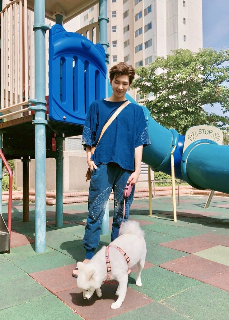 taking his dog for a walk