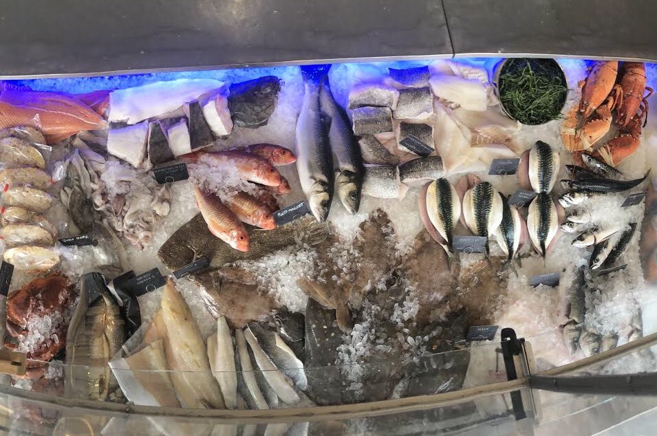 The fish counter is looking particularly well-stocked today, including some wild sea bass freshly caught by our very own fishmonger, Flea 🎣