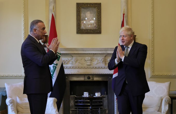 Prime Minister Boris Johnson greeting Prime Minister Mustafa al-Kadhimi of Iraq in Downing Street.