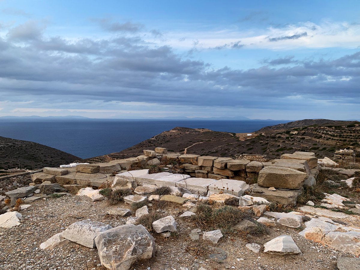 4/9 The deep foundations of the temple are still visible, and the rest of the architecture is scattered around the site, some organized in piles by the excavators and others built into the modern field boundaries that ring the Kynthos hill! – bei  Delion